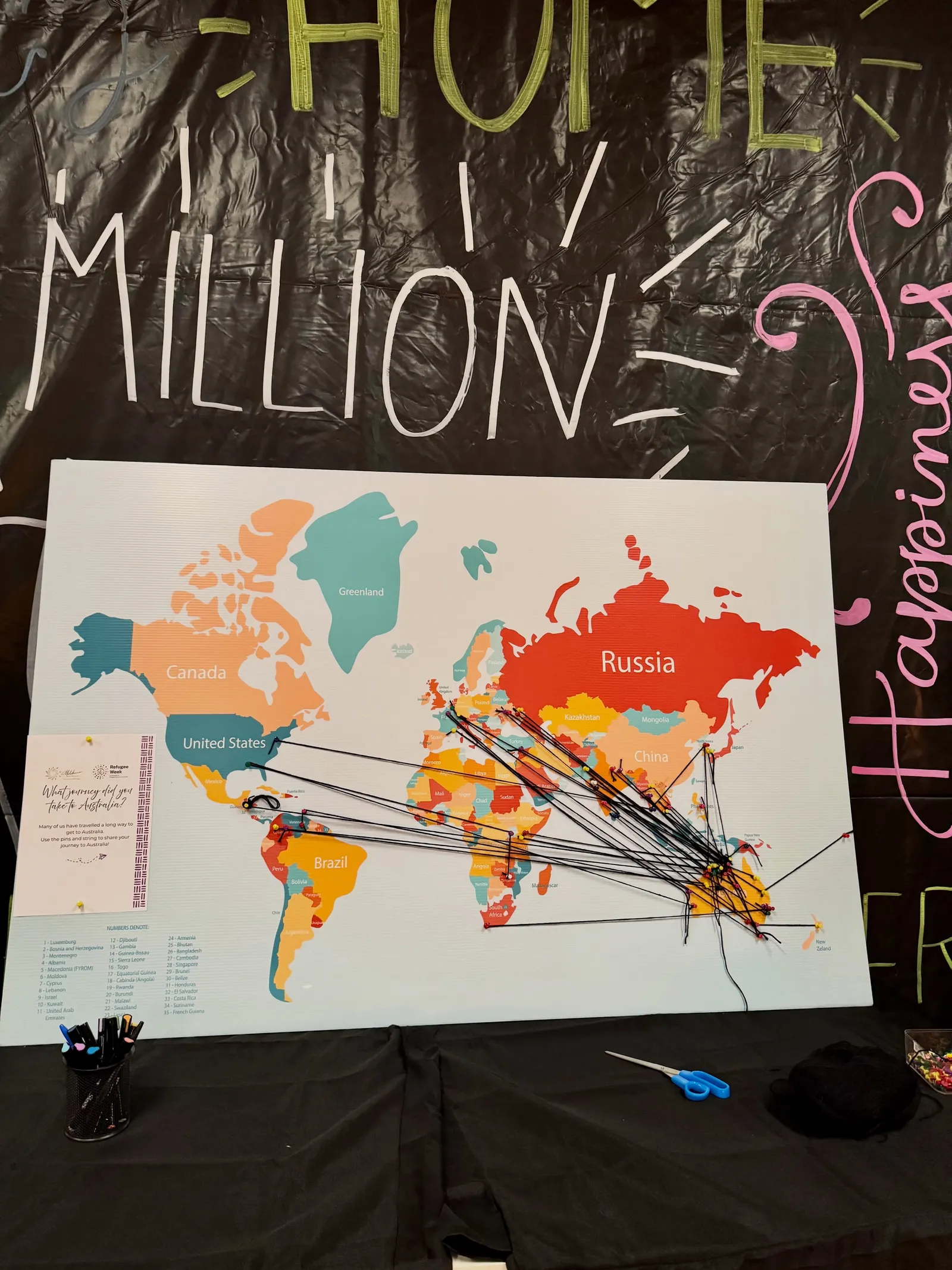 Interactive map showing journeys to Australia beneath the A Million Stories display