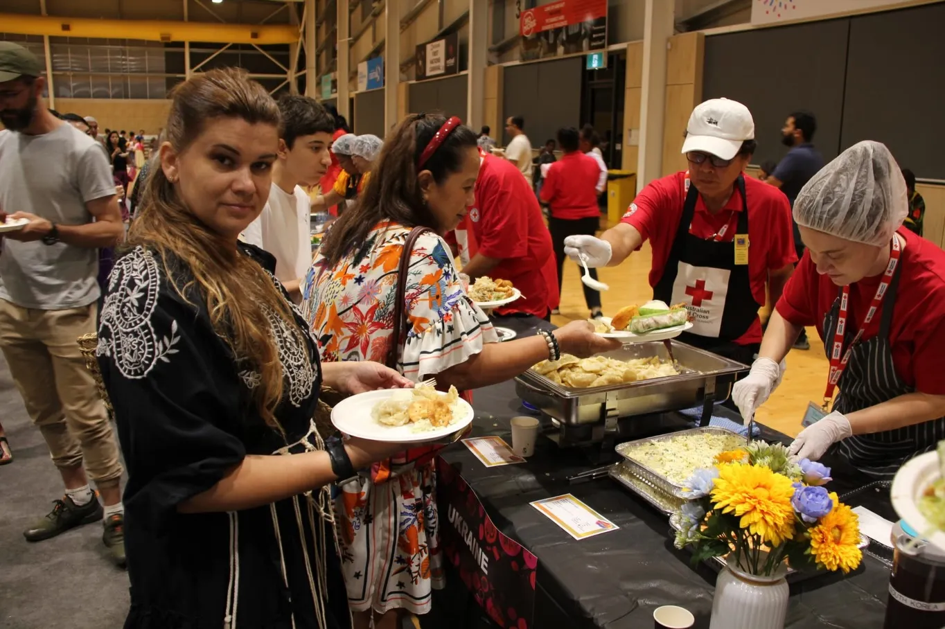 Festival visitors being served Ukrainian food